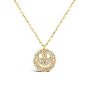 Solid 14K yellow gold weighing 2.40 grams with 101 round prong-set diamonds weighing .24 carats Smiley Face Necklace | Nuha Jewelers